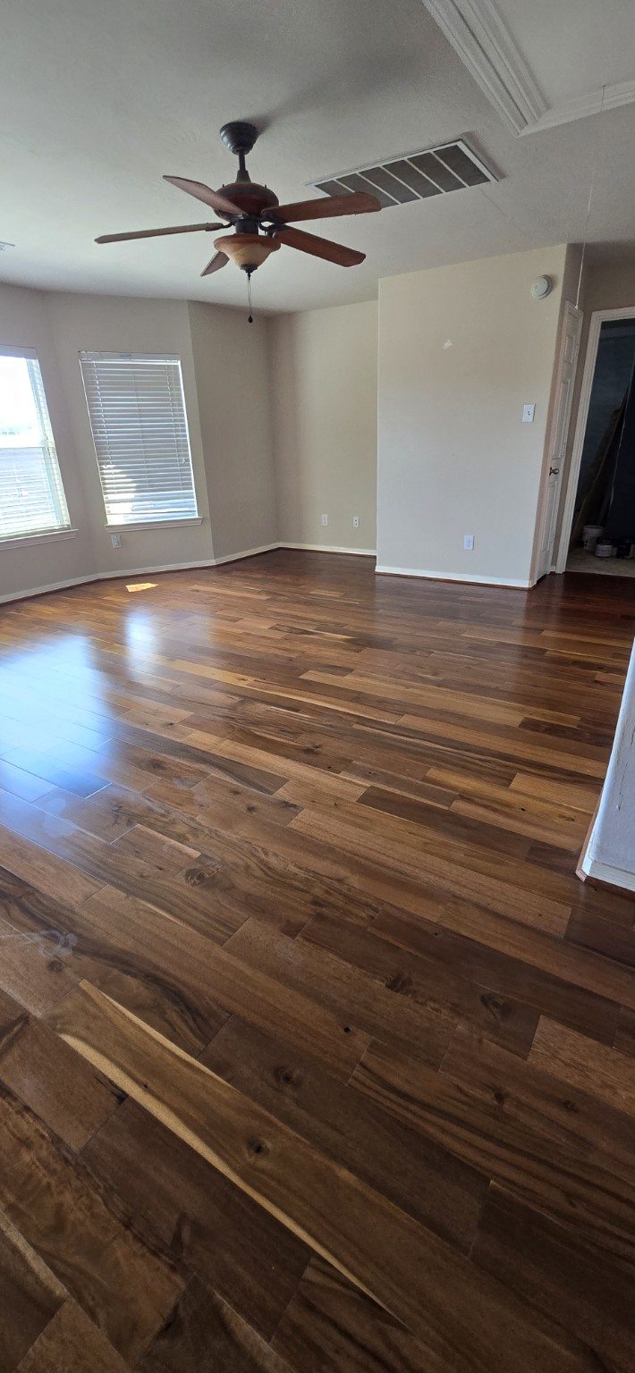 Warm brown wood flooring in a living room